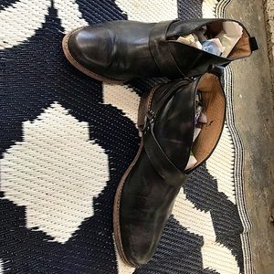 Black “worn look” leather Koolaburra booties.